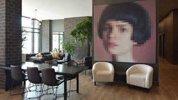 Modern dining area with artistic wall display